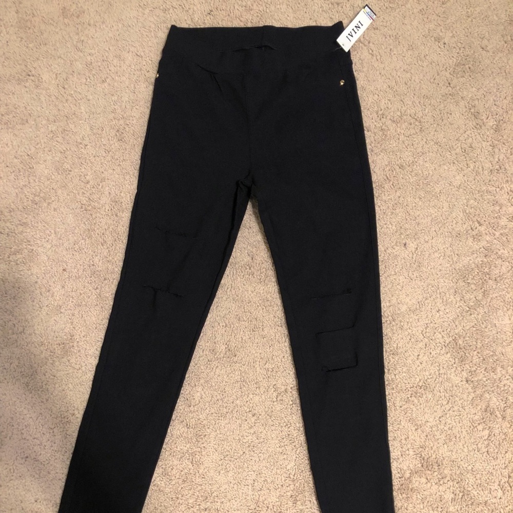 Brand new black slit skinny jeans! Petite womens M